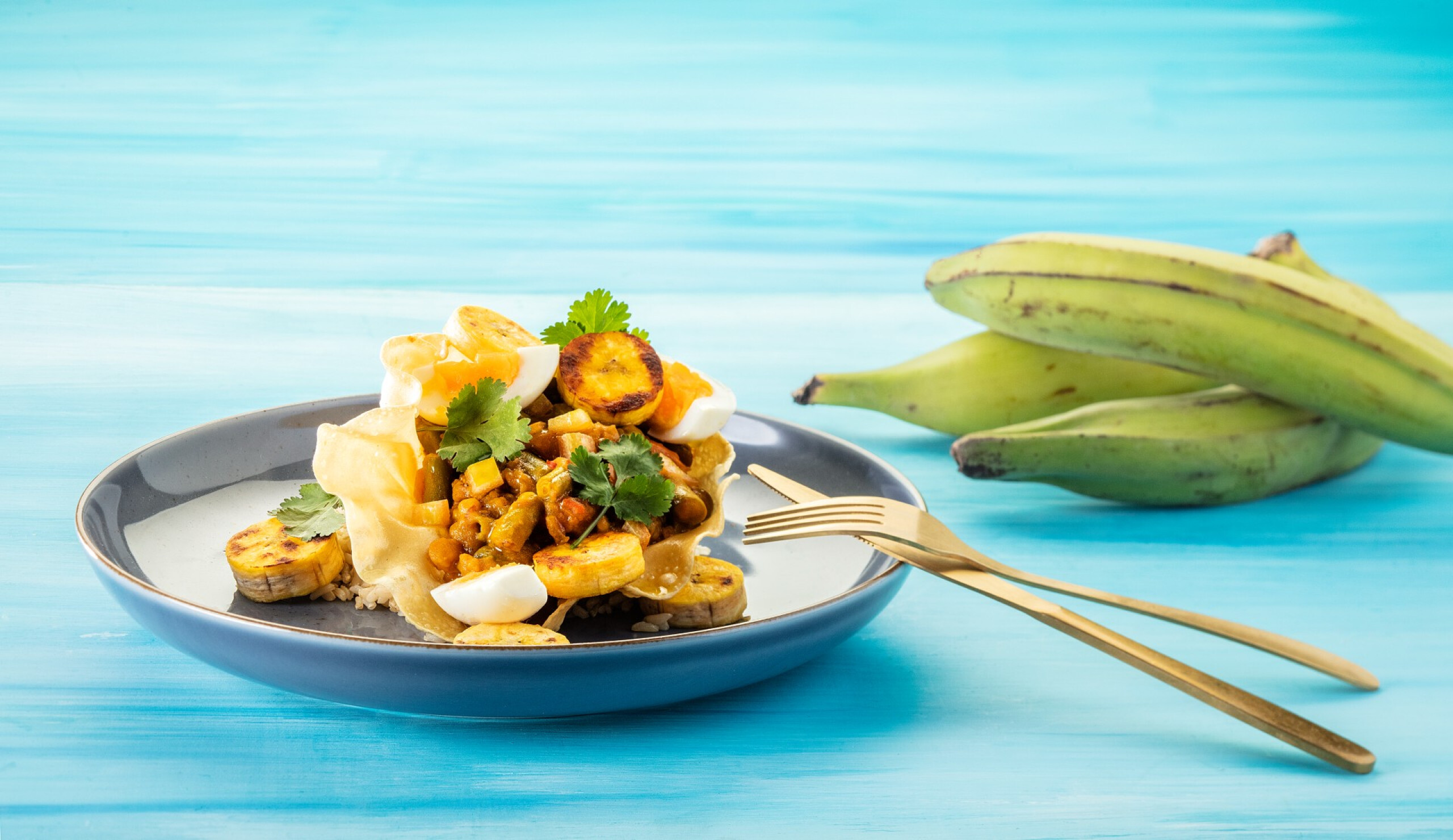 Surinaamse curry met sperziebonen, bakbanaan en pappadum