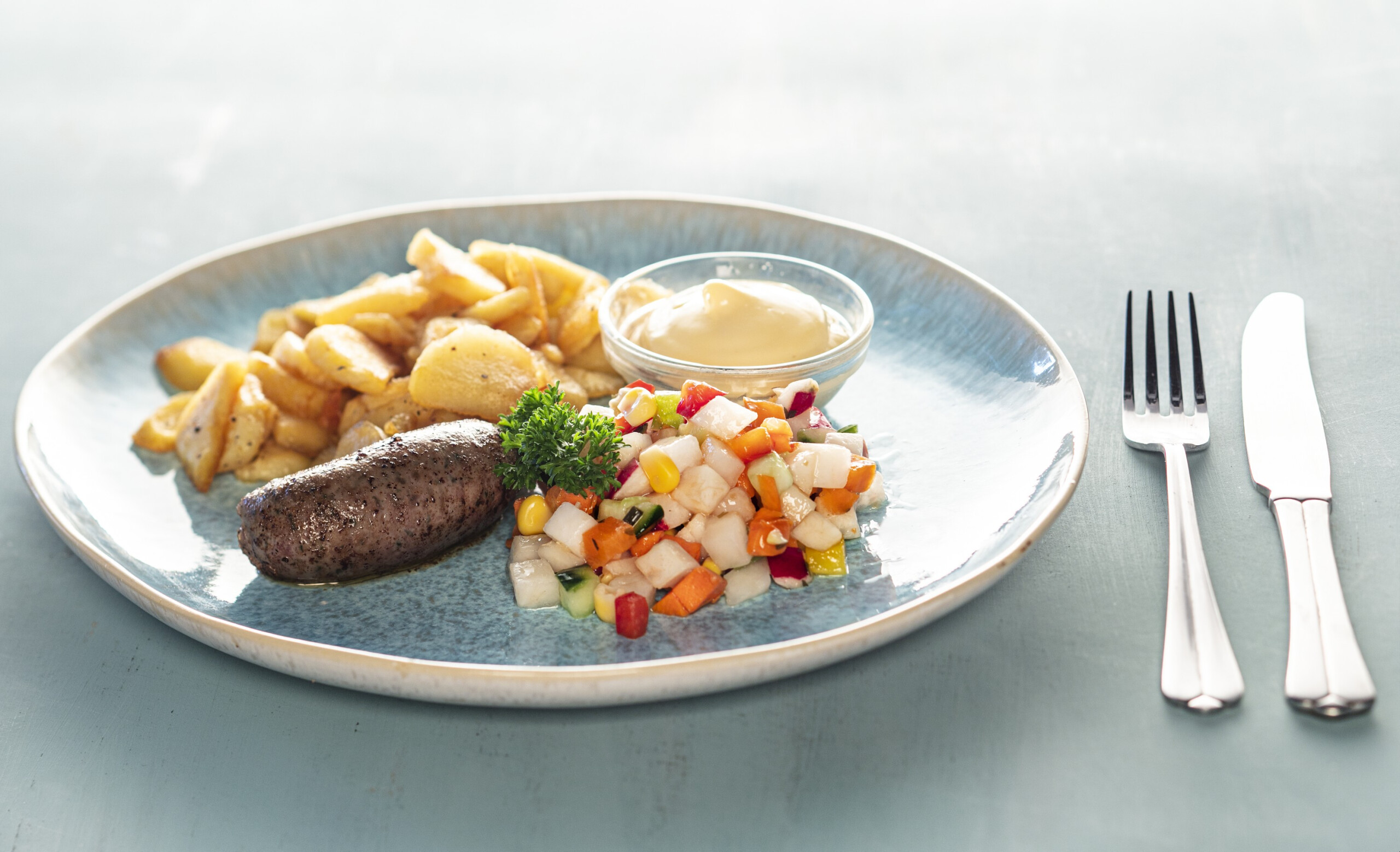 Kalfsworst met gebakken aardappels