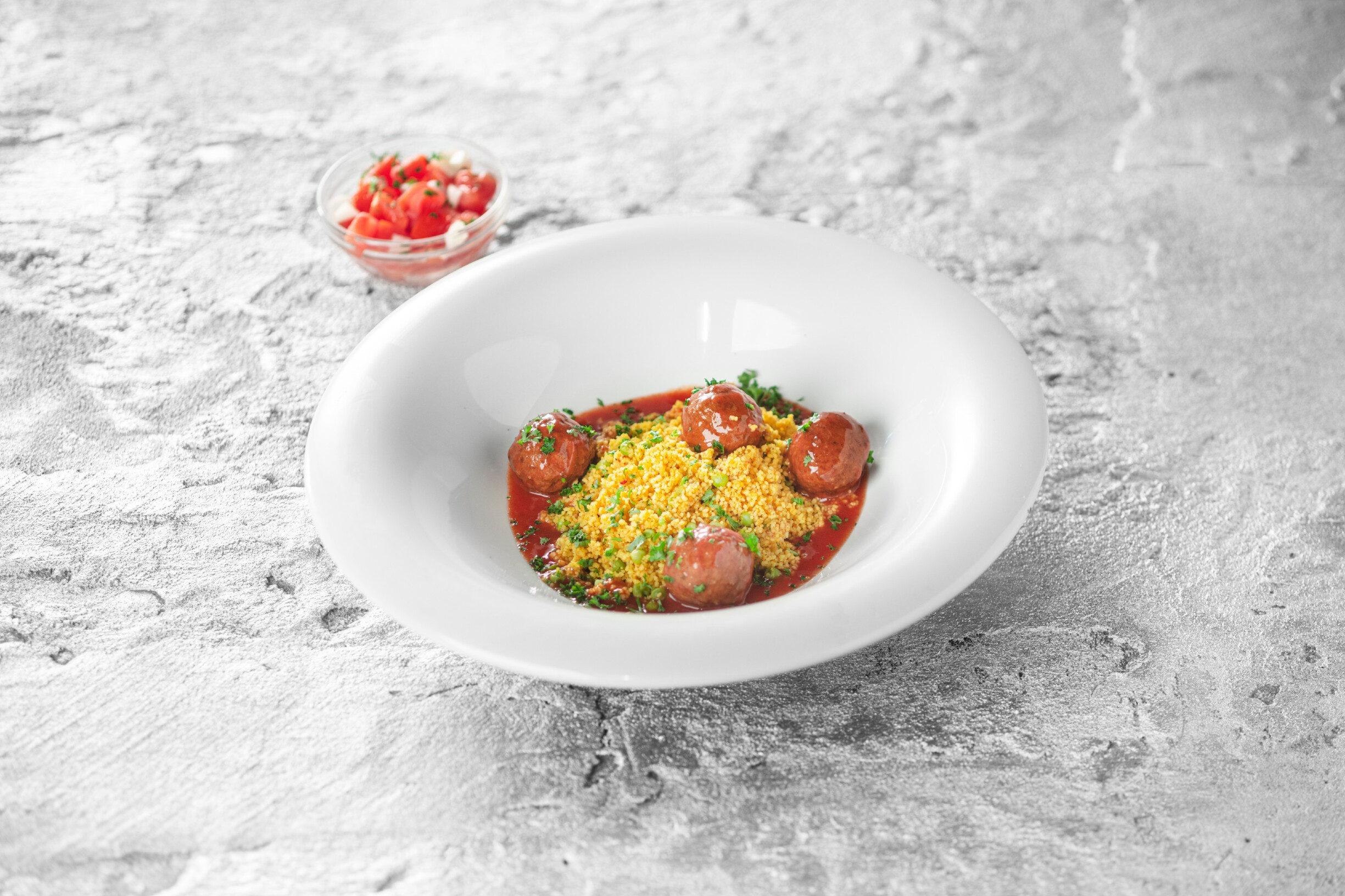 Gehaktballetjes in tomatensaus met couscous